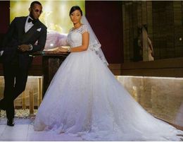 Classic Africa White Ball Gown Wedding Dresses With Short Sleeve Appliqued Lace Beaded Scoop Neck Court Train Long Chapel Bridal Gowns Custom Made