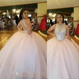 2021 Exquiste Vintage Light Pink Quinceanera Dresses Silver Crystal Beads Jewel Neck Illusion Hollow Back Plus Size Formal Party Prom Evening Gowns Floor Length