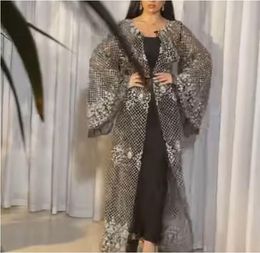 Evening dress Yousef aljasmi Zuhair murad Black lace Appliques Puffy sleeve Silver Crystals Long sleeve Cape Kim kardashian Kylie jenner