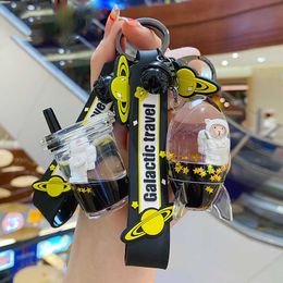 Creative Black Liquid Floating Space Bear Key Chain Star Sequins Rocket Model Bottle Keychain Cute Milk Tea Cup Car Keyring Gift G1019