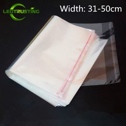 Leotrusting 100pcs 31-50cm Width Large Clear OPP Adhesive Bag Transparent Poly Resealable Packaging Bag Self Plastic Gift Bag 210325