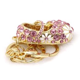 Fashion Chinese embroidered shoes shape keychain alloy three-dimensional white paint small flower personality car key ornaments