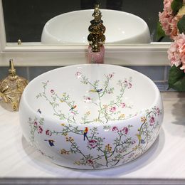 China Artistic Handmade Ceramic Lavobo Round Countertop round flower bird table top basin bathroom sink