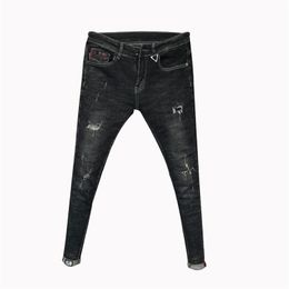 Großhandel Mode geschredderte Hosen trendige Herren Slim Jeans koreanische Denim soziale Jugend Füße Friseur Bleistift 211108