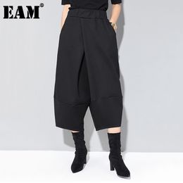 [EAM] Spring Autumn High Elastic Waist Black Loose Big Pocket Brief Loose Harem Pants Women Trousers Fashion JQ012 210512