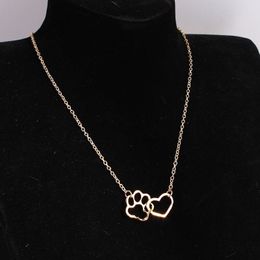 Simple European and American animal foot paw peach heart pendant hollow clavicle chain necklace wholesale