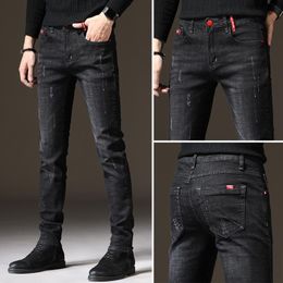 Erkekler kot marka erkekler ince fit sıska denim tasarımcı elastik düz streç pantolon