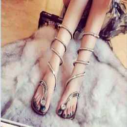 European Snake-shaped Winding Rhinestone Shiny Roman Sandals With Flat Heel