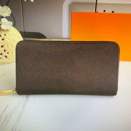 M41894 ZIPPY fashion Men's clutch bag luxury designer leather ladies exotic long zip wallets card holder wallet with box246b