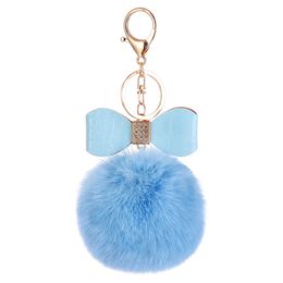 Classic Design Fur Puff Key Holder Plush Ball Shape Pom Gold Leather Bow Tie Keychain for Kids Women