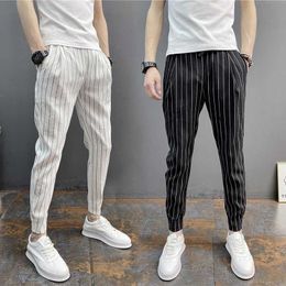 Summer new men's vertical striped small leg casual pants net red matching pants hemmed in slim Capris stretch Harem Pants X0723