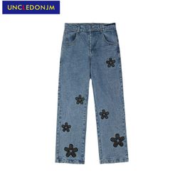 Men's Jeans UNCLEDONJM Flower Patch Retro Street Hip Hop Blue Baggy Designer Pants Distressed Denim For Men 9041