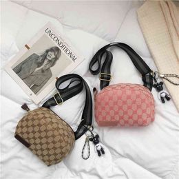 Net red small bag women's chest summer new canvas shell leisure wide shoulder belt messenger