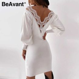 BeAvant Sexy V-neck patchwork dress White lace edge A-line Lantern Sleeve Dress Autumn nightclub open back knee length dress 210709