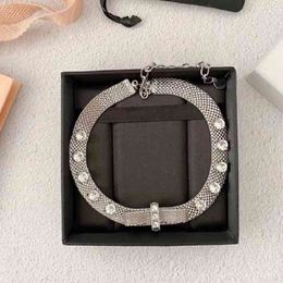 MIU 21 New Mesh Retro Three-Dimensional Bow Crystal Hollow Light Luxury High-end Short Chain Necklace All-match