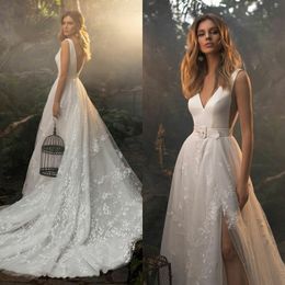 Bohemian 2021 Side Split Wedding Dresses Lace Appliqued Bridal Gowns Deep V Neck Beaded Crystal Boho Backless Robes De Mariée
