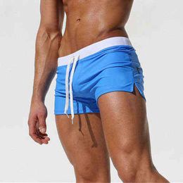 2021 new men's swimsuit sexy hot beach short Flat corner breathable quick drying pants 220312