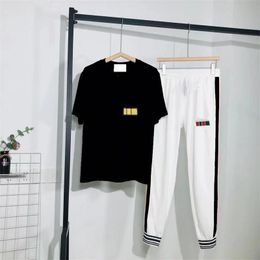 Mens designer tracksuits 2023 luxury black and white short sleeve long suit hero 12 styles joggers hip hop male women sweatshirts sportswear