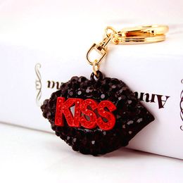 Creative rhinestone lips set heart-shaped perfume bottle keychain ladies bag metal pendant clover keychain small gift