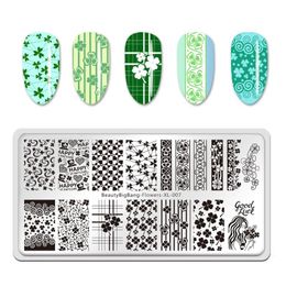 leaf stencil UK - False Nails Nail Stamping Plate St. Patrick's Day Four-leaf Clover Theme Flowers Manicure Art Image Template Stencils Tool