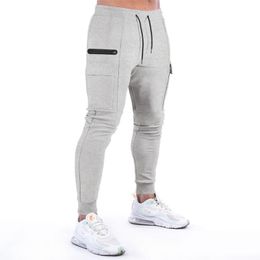 Pantaloni da uomo Pantaloni da jogging Casual Palestra Panno di cotone Pantaloni traspiranti Multi-tasca Cargo Bocca del piede Pantaloni della tuta skinny Maschile