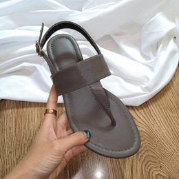 New clip toe clip foot metal buckle leather flat sandals antiskid pregnant women sandals Beach Women's shoes