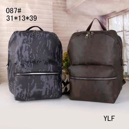 Brand women backpack messenger bag Letter print Fashion men backpacks student leather studentmen package black brown 31*13*39cm