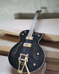 Black body Electric Guitar with Rosewood fingerboard ,Gold hardware,Tremolo system,Provide customized services