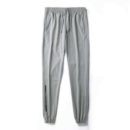 Mens Joggers Casual Pants Fashion Breathable Running Trousers Fat Sweatpants Men Quick Dry Loose Fitness Pants Men Plus Size 7XL X0723