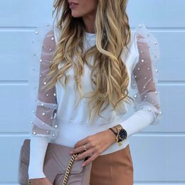 blusa transparente blanca