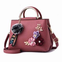 HBP Non- Solid Colour fashion three-dimensional embroidery flower iron handle portable Pu women's bag Korean trend classic 1 sport. 3TA1 HT23