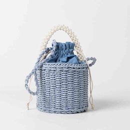 Shopping Bags Fashion Pearl Chain Top Handle Summer Straw Handmake Bucket Beach Handbags Solid Drawstring Crossbody Purses for Women 220303