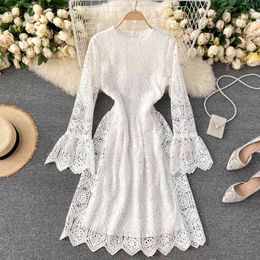 Women Korean Lace Dress O Neck Flare Sleeve A Line Dress Autumn Solid Casual Elegant Hollow Out Dress 210419