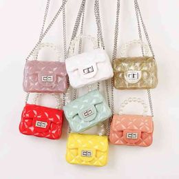 INS Hotsale Pearl Handle Candy Colour Jelly Handbags Cheap Price Mini Women Handbags Cute PVC Glitter Ladi Bags