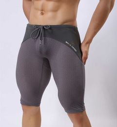 BRAVE PERSON Summer Style Breathable Mesh Men Tight casual Shorts Bodybuilding Solid Tights sexy Transparent 210714