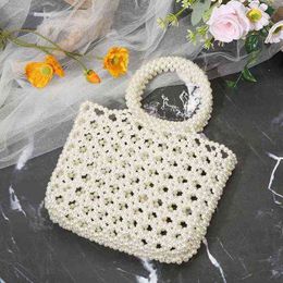 Shopping Bags Handmade Pearl Hollow Beaded Handbag Fashion Ladies Luxury Handbags Women Designer Summer Party Beach Tote220307