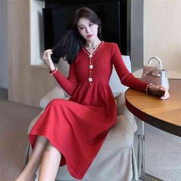 JXMYY new product beaded V-neck goddess over the knee knitted dress female autumn and winter diamond button A-line skirt 210412