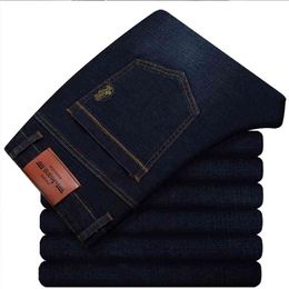 Бизнес мужские негабаритные джинсы большой размер свободных повседневных брюк высокая талия стрейч прямые брюки ноги осень и зима новый 210331