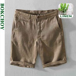 2021 Summer Spring New Men Linen Loose Shorts Casual Beach Five-point Pants Workwear Pure Cotton Solid Colour Pants GC-8216 H1210