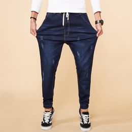 6XL 7XL 8XL Jeans da uomo elasticizzati di grandi dimensioni Pantaloni stile Harem in vita elastica in stile cinese Pantaloni in denim strappati casuali blu
