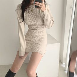 Women Autumn Winter Sexy Hollow Out Knitted Skinny Bodycon Midi Dress Long Sleeve Warm Slim Sweater Dress Sheath Vestidos 210514