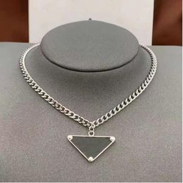 2021 womens mens designs Necklace chain fashion Jewellery black and white triangle pendant design party silver hip hop punk men necklaces names