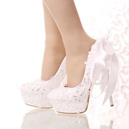 white bridal shoes with bow