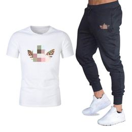 Mens Pattern Printing Tracksuit Fashion Trend Round Neck Short Sleeve Tops Slim Trousers Suits Designer Male Casual Gyms Fitness Two Pieces Sets