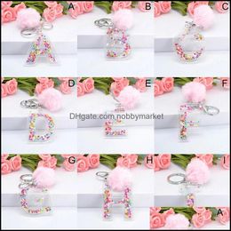 Key Rings Jewellery Letter Keychains 26 Glitter Hollowed-Out English Alphabet Car Ring Women Handbag Crafts With Puffer Ball Gift Drop Deliver