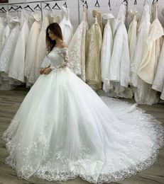 Vestido De Novia 2023 Luxury Custom Made Ball Gown Wedding Dress Bateau Lace Sheer Long Sleeve Appliqued Royal Train Princess Dubai Arabic Bridal Gowns M50