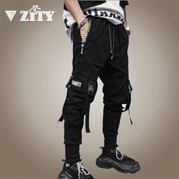 Hip Hop Streetwear Homens Preto Harem Calças Multi-Pocket Fitas Carga Calças Casuais Calças Masculinas Calças Calças Para Homens Roupas 211119