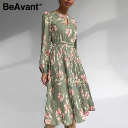 BeAvant Elegant floral print dress women round neck long sleeve ruffled holiday dress middle waist autumn winter dresses 210709