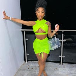 BKLD 2021 Summer Fashion Neon Color Two Piece Set Faux PU Leather Sexy Cut Out Crop Top And Ruched Drawstring Bodycon Mini Skirt X0428