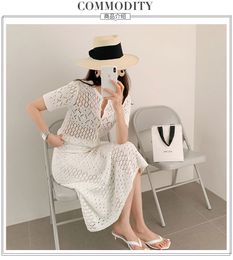 New design women's knitted hollow out summer short sleeve tee and mermaid midi long skirt 2 piece dress suit